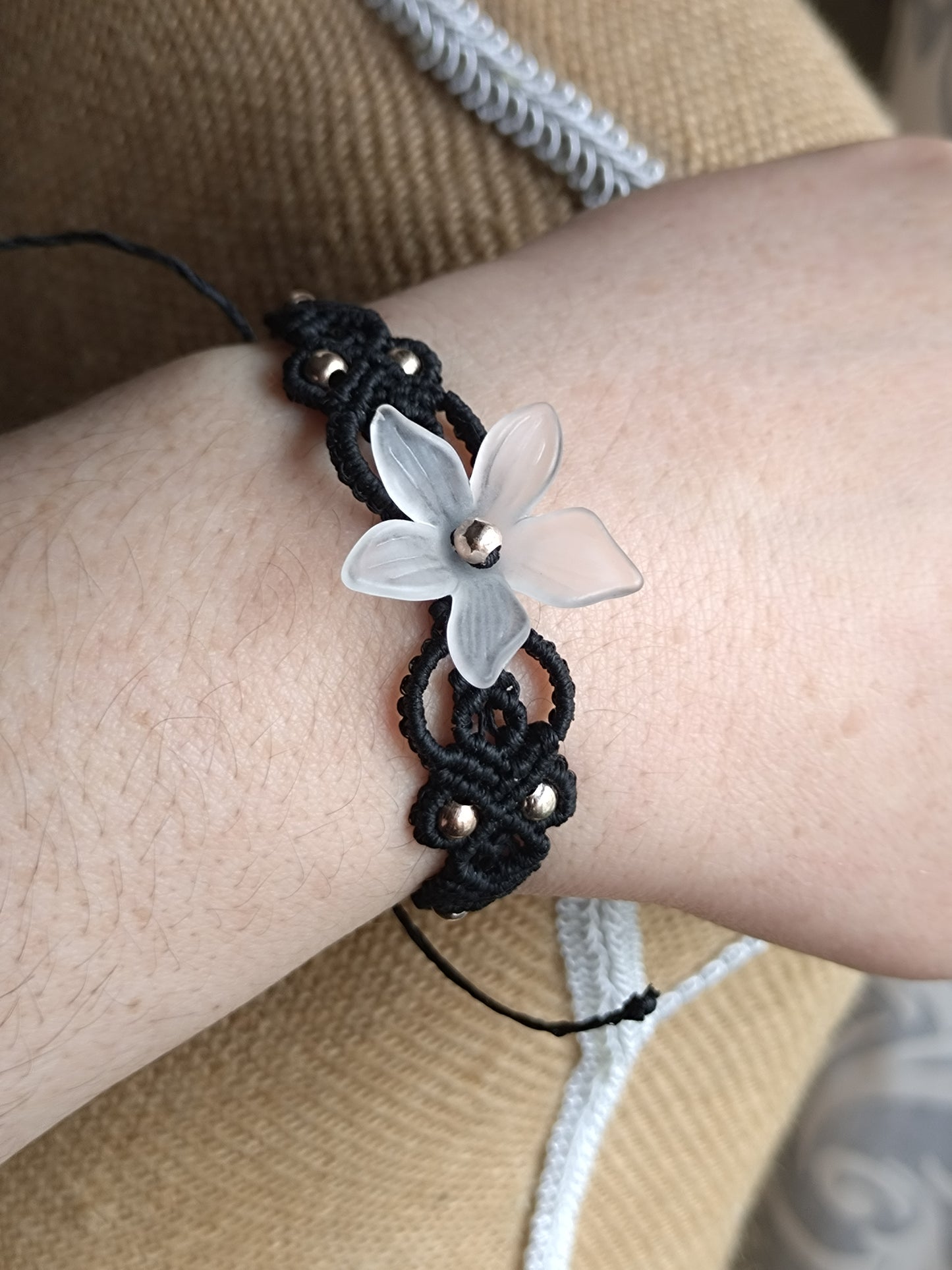 Black bracelet with flower