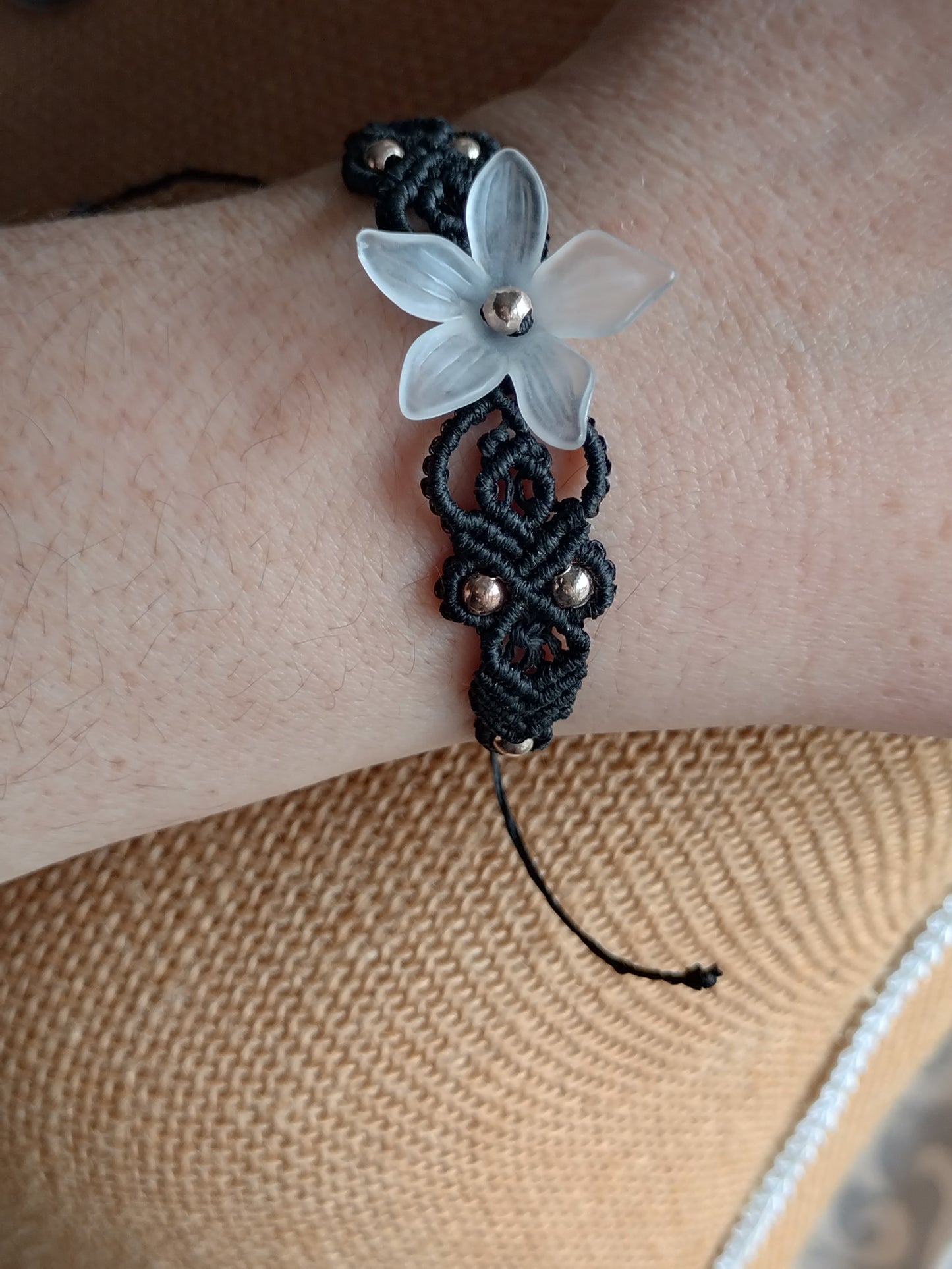 Black bracelet with flower