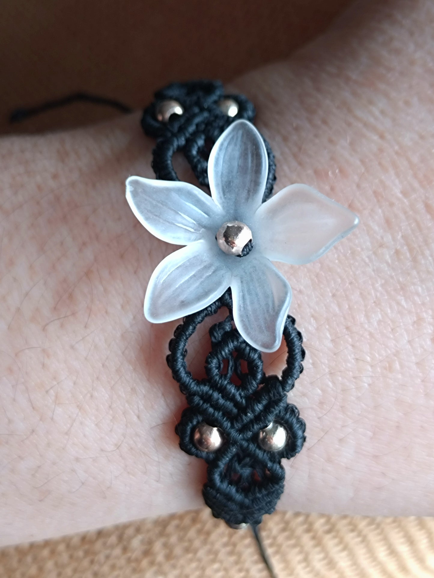 Black bracelet with flower