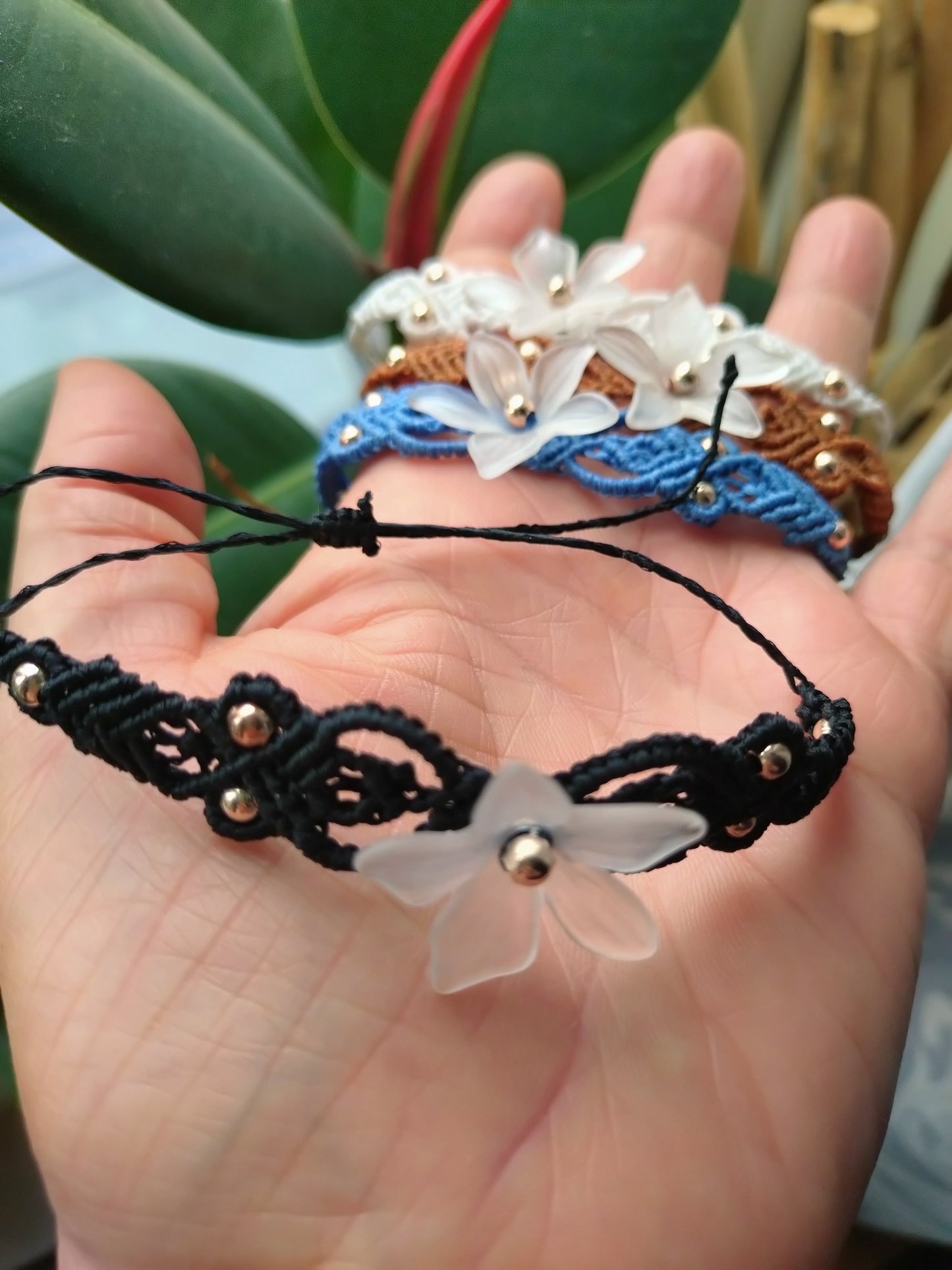 Black bracelet with flower